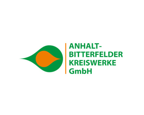 Logo for Anhalt-Bitterfelder Kreiswerke GmbH featuring a green leaf with an orange inner shape and the company name in green.