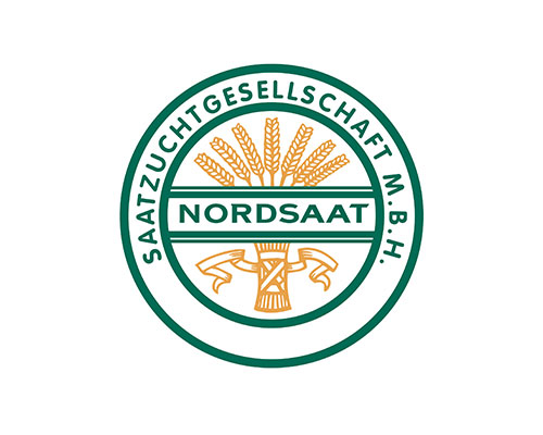 Circular NordSaat seed company logo featuring wheat ears above, a windmill emblem, and the text 'NORDSAAT' within a green ring reading 'SAATZUCHTGESELLSCHAFT M.B.H.'